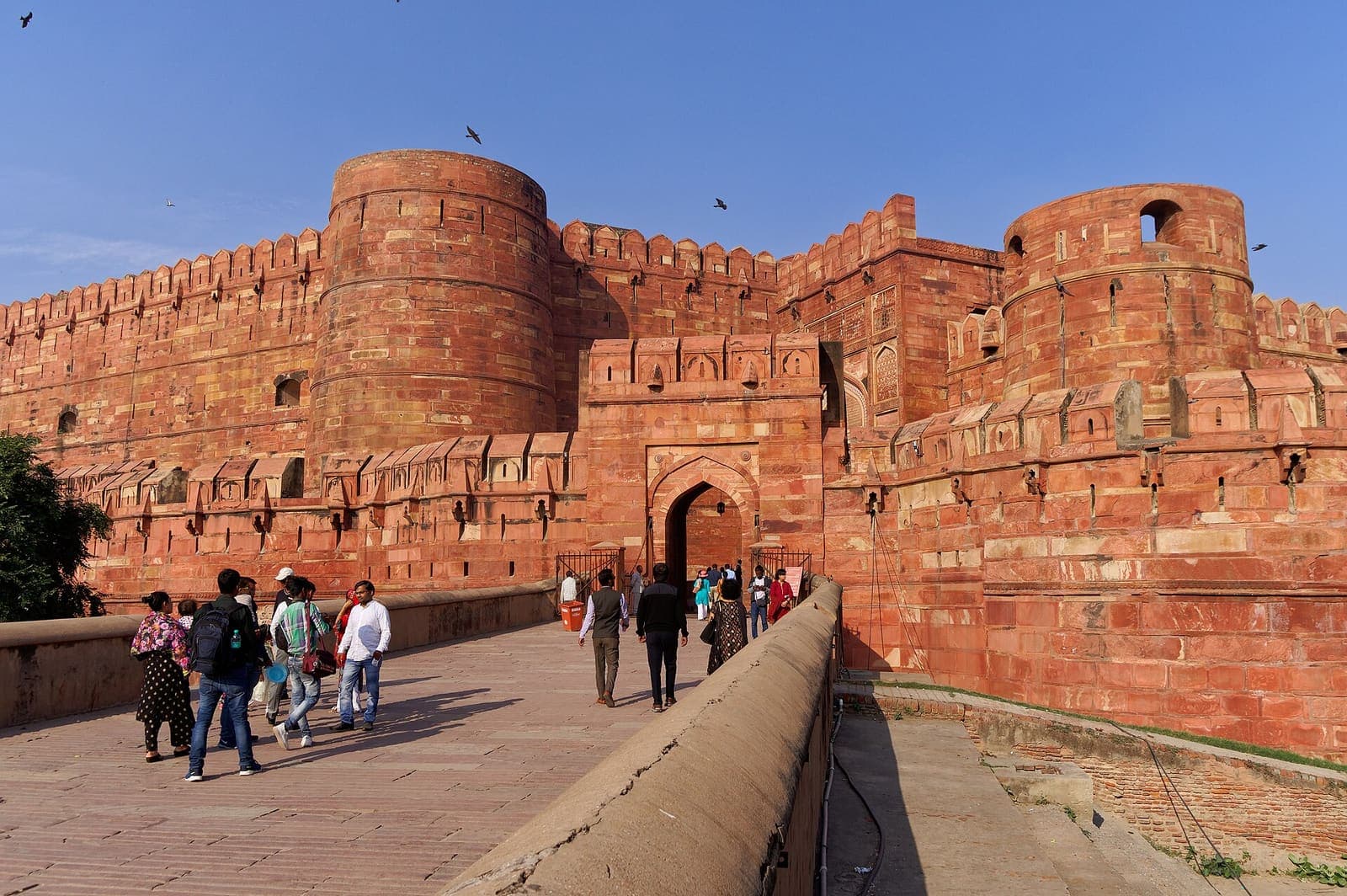 Agra Fort’s Amar Singh Gate, the visitors’ entrance, between round red sandstone bastions at the end of the bridge over the moat