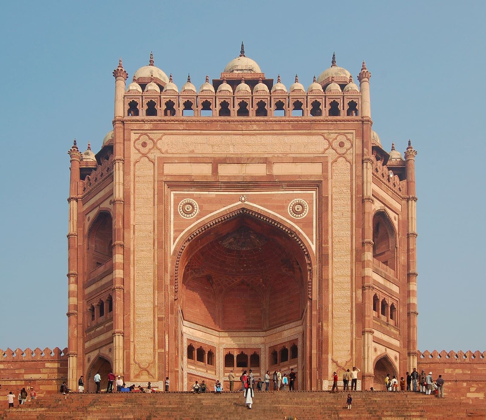 Buland Darwaza, the towering red sandstone gateway to the Jama Masjid at Fatehpur Sikri, under a blue sky